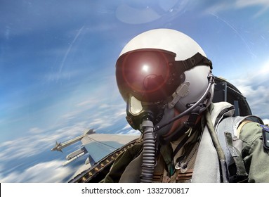 Fighter pilot cockpit view at sunrise