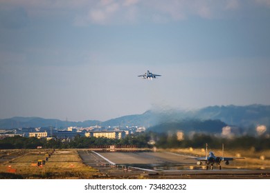 The fighter plane which takeoff in the evening sky