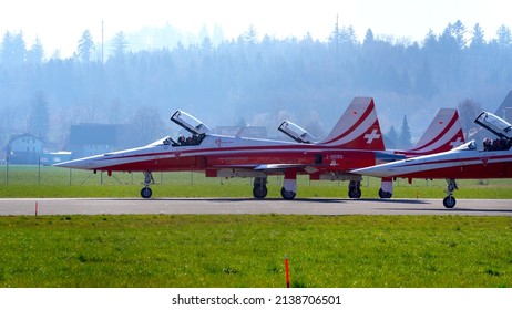 Fighters Northrop F-5E Tiger II of Patrouille Suisse ready for takeoff at Swiss Air Force Airbase Emmen, Canton Lucerne, on a sunny spring noon. Photo taken March 23rd, 2022, Emmen, Switzerland.