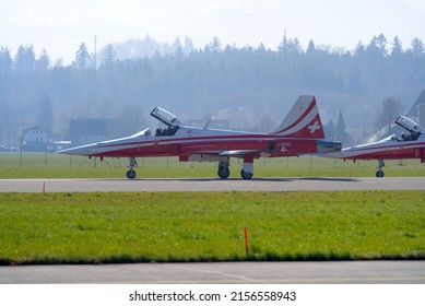 Fighters Northrop F-5E Tiger II of Patrouille Suisse ready for takeoff at Swiss Air Force Airbase Emmen, Canton Lucerne, on a sunny spring noon. Photo taken March 23rd, 2022, Emmen, Switzerland.