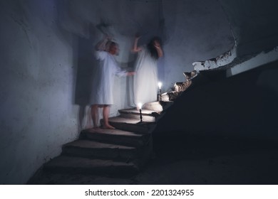 Fighting Psycho Couple In Old Creepy House At Night. Concept Of Crime And Domestic Violence 