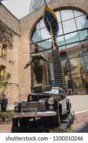 Figueras , Spain ; 0403 2018 : Courtyard, With Cadillac Installation At Lower RightThe Dalí Theatre And Museum  Is A Museum Of The Catalan Artist Salvador Dalí In  Town Of Figueres, Catalonia, 
