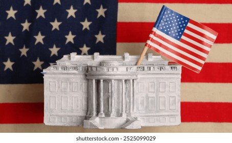 a figure of the American White House on the background of the American flag - Powered by Shutterstock