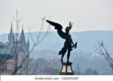 Figure of an angel on the Czech bridge in Prague. Angel over the Vltava.