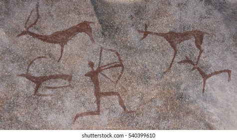 Figure animals   hunter the stone wall the cave paint ocher ancient prehistoric Neanderthal  prehistoric animal  stone age hunting for deer