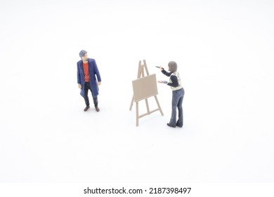 The Figure Of Artists Sketching Model In Bright Drawing Class