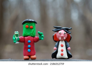 A Figure Of Frankenstein And A Vampire. A Toy Monster Made Of Plasticine. Ideas For Halloween.