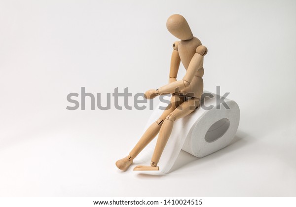 figure of a man sitting on a roll of toilet
paper holding his stomach, diarrhea, abdominal pain, food
poisoning, intestinal
infection