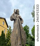 Figure of Merciful Jesus next to the church and cemetery in Góra Swietej Malgorzata (Mount of Saint Margaret) in Poland.