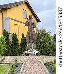 Figure of Merciful Jesus next to the church and cemetery in Góra Swietej Malgorzata (Mount of Saint Margaret) in Poland.