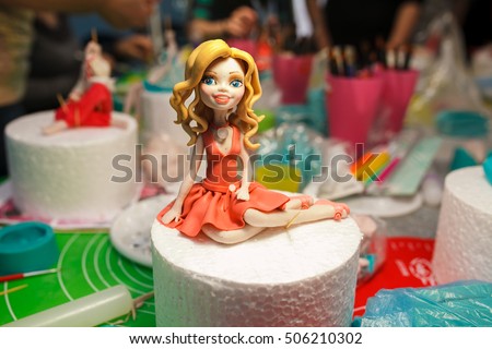 figure on children's cake. Barbie Doll Princess Cake