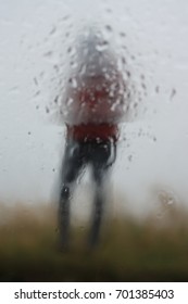 figure in the rain 