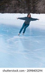 Figure Skater On Ice. The Girl Is Skating. Ice Under The Open Sky. No Makeup In Winter, Red Cheeks