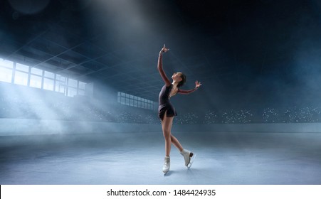 Figure skating couple in professional ice arena. - Shutterstock ID 1484424935