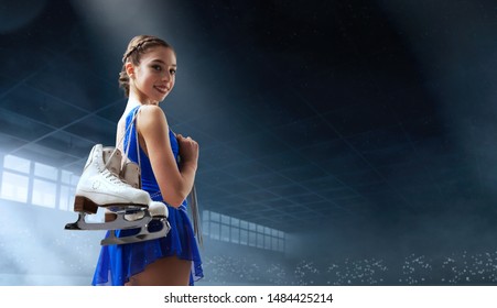 Figure Skating Couple In Professional Ice Arena.