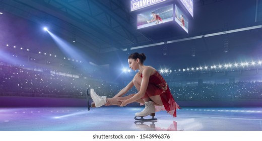 Figure Skating Girl In Ice Arena.