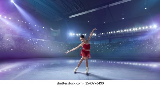 Figure Skating Girl In Ice Arena.