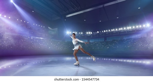 Figure Skating Girl In Ice Arena.