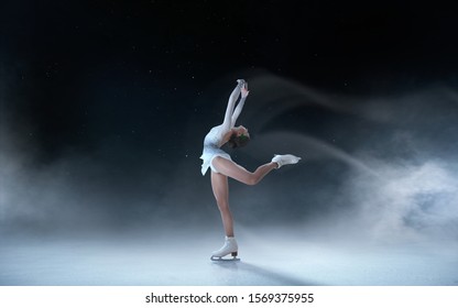 Figure skating girl skating on ice. - Shutterstock ID 1569375955