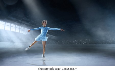 Figure Skating Girl In Professional Ice Arena.