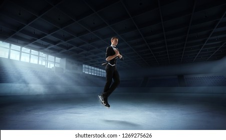 Figure Skating Pair In Ice Arena