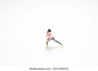 a figure warming up while doing stretching exercises