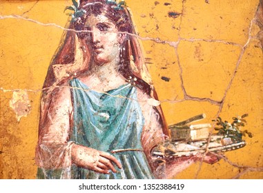Figure of a woman painted in a Fresco in a Domus of Pompeii