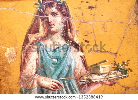 Figure of a woman painted in a Fresco in a Domus of Pompeii