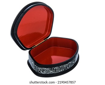 figured Black and red lacquered wooden casket with golden floral pattern on white background. Empty open casket for storing accessories, small items, valuables and jewelry. Luxury gift packaging. - Shutterstock ID 2190457857