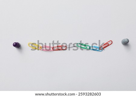 Figures with chain on light background. Link concept