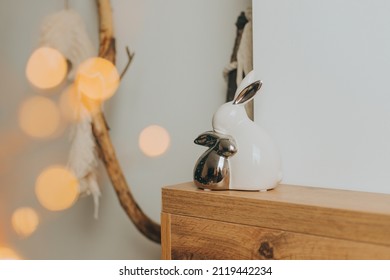 Figurine interior ceramic rabbits on the rack