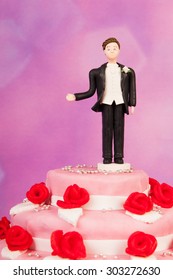 Figurine Man Alone At The Wedding Cake