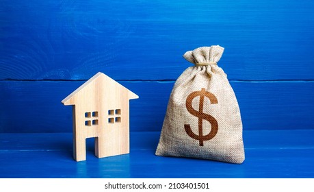 Figurine silhouette house and dollar money bag. Buying and selling real estate. Maintenance, property improvement. Taxes. Mortgage loan. Sale of housing. Proposal for a deal price. First installment.