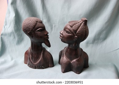 Figurines of an African man and woman. wood carving