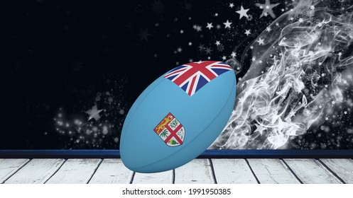 Fiji flag on rugby ball over wooden surface against smoke effect and stars on black background. sports tournament and competition concept - Powered by Shutterstock