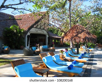 Fiji With Palm Trees, Sea, Pool And Deck Chairs