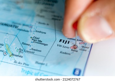 Fiji pin on a world map. Fiji travel destination planning pinned