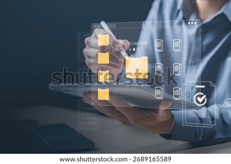file, conflict, resolve, sync, version, merge, keep, A person managing digital folders on a tablet, symbolizing cloud file sync, version control, and conflict resolution in data management systems.