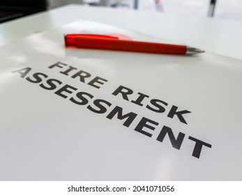 A file containing the Fire Risk Assessment, a legal requirement in the UK to assess and reduce the rise of fire for commercial properties, blocks of flats and workplaces.