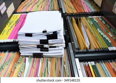 A File Folder With Documents And Important Documents