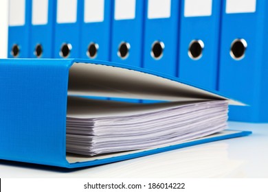 File Folder With Documents And Documents. Retention Of Contracts.