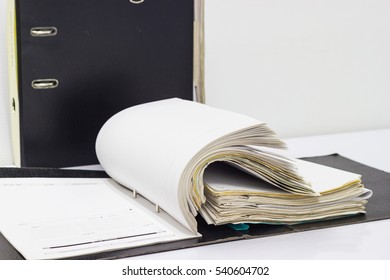 File Folder With Documents And Documents. Retention Of Contracts. 