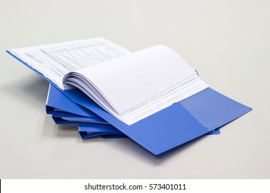 file folder with documents and documents. retention of contracts on the table  - Powered by Shutterstock