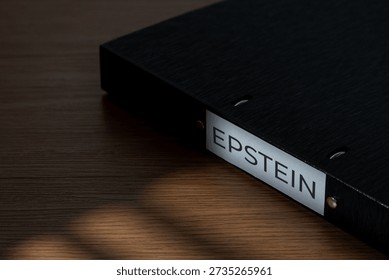 A file folder labeled EPSTEIN on a wooden desk. Investigations, court documents, hidden evidence, and public scandals related to high-profile legal cases concept.