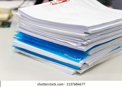 file folder and Stack of business report paper file on the table in a work office, concept document in work office