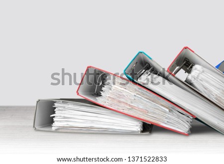 File folders with documents on background