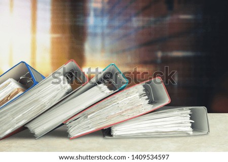File folders with documents on background