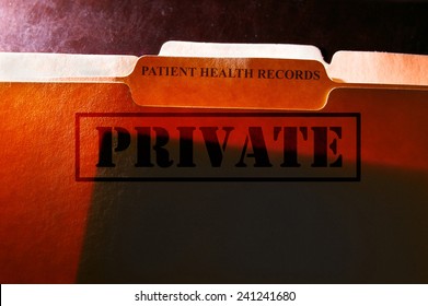 File Folders With Patient Health Records Label And Private Stamp