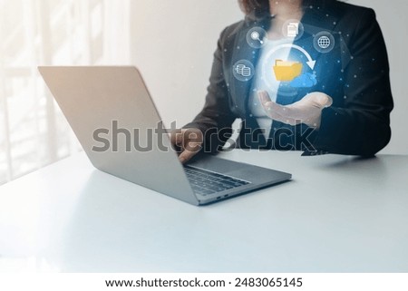 File management and uploading file data to online databases, storing data files on the cloud, managing document data in organizations, managing online databases, using the cloud in companies.