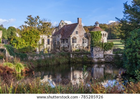 

File name:
    a reflection of Old Scotney castle in moat waters on a sunny day 